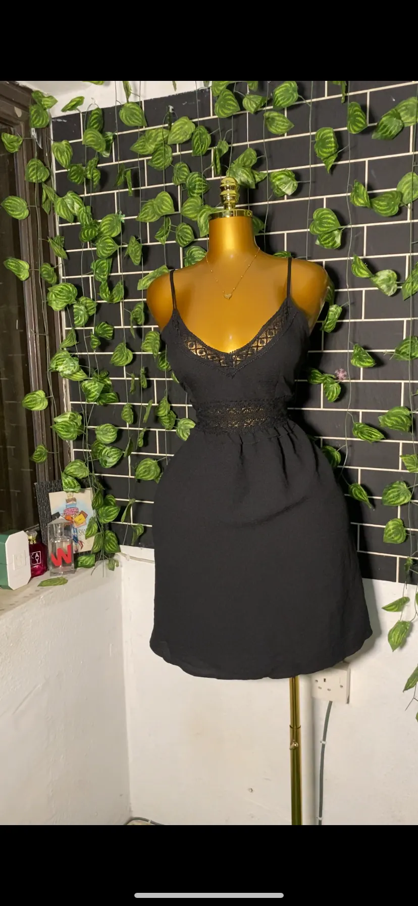Cute black dress with cute out on the waist area 
